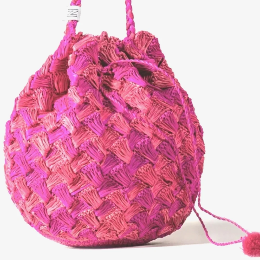 URBAN OUTFITTERS Bermuda Crochet Tassel Raffia Bucket Drawstring Crossbody NWT